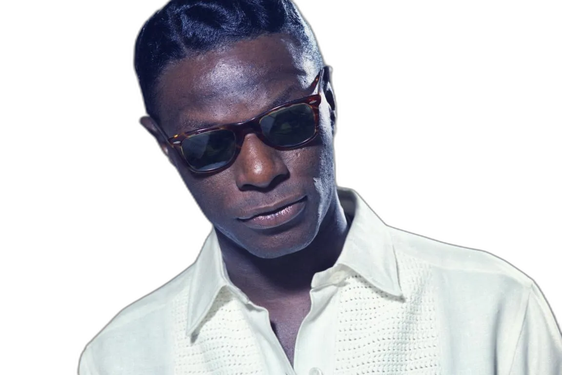 https://songwiz.nyc3.digitaloceanspaces.com/static/model/thumbnails/NatKingCole.webp