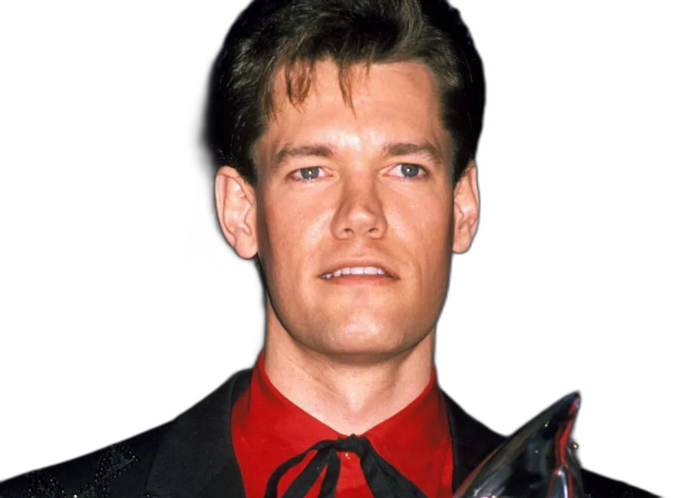 https://songwiz.nyc3.digitaloceanspaces.com/static/model/thumbnails/RandyTravis1987.webp